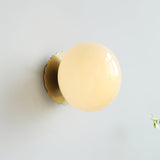Vintage Brass Globe Glass Wall Sconce 1-Light